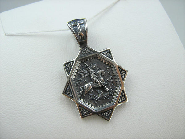 Solid 925 Sterling Silver oxidized icon pendant and medal with prayer scripture to Saint George Victorious depicting the battle with Dragon. Item number MD001906. Picture 5