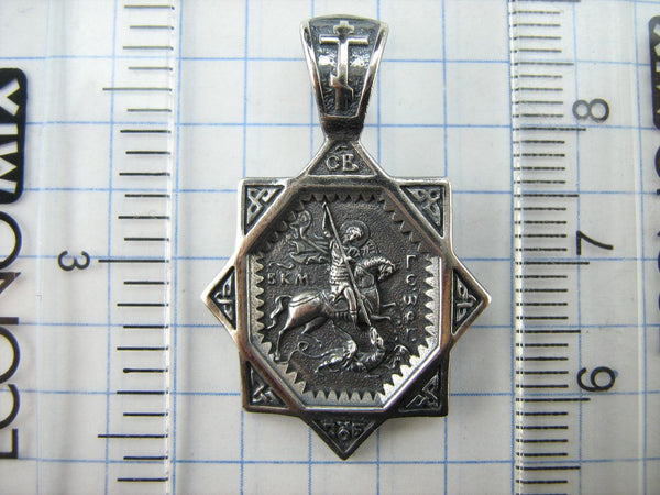 Solid 925 Sterling Silver oxidized icon pendant and medal with prayer scripture to Saint George Victorious depicting the battle with Dragon. Item number MD001906. Picture 6