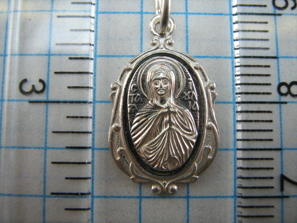New and never worn solid 925 Sterling Silver small icon pendant and medal with Christian prayer inscription to Saint Martyr Julia holding old believers cross and decorated with filigree frame. Item number MD000730. Picture 8