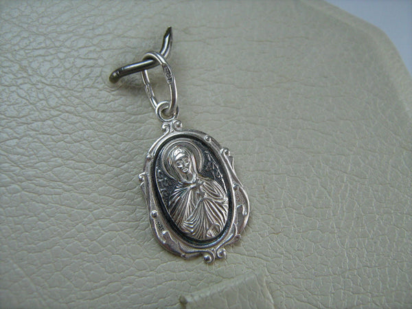 New and never worn solid 925 Sterling Silver small icon pendant and medal with Christian prayer inscription to Saint Martyr Julia holding old believers cross and decorated with filigree frame. Item number MD000730. Picture 5