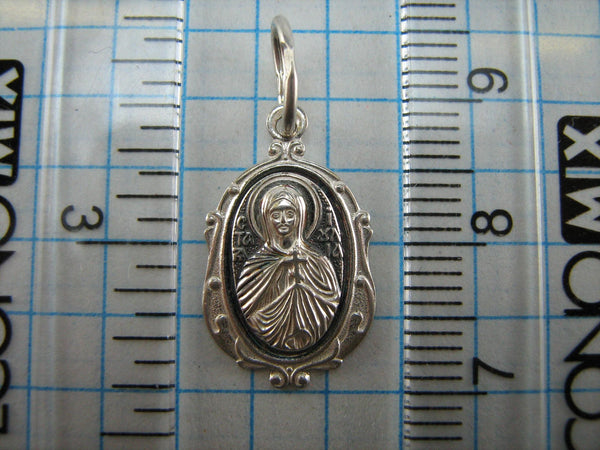 New and never worn solid 925 Sterling Silver small icon pendant and medal with Christian prayer inscription to Saint Martyr Julia holding old believers cross and decorated with filigree frame. Item number MD000730. Picture 6