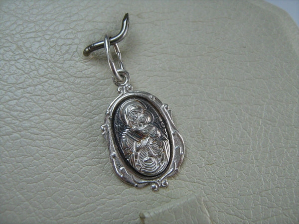 New solid 925 Sterling Silver detailed and oxidized pendant and medal in filigree frame depicting the icon of Mother Mary Tenderness, also called Eleousa, and Jesus Christ. Item number MD000712. Picture 5
