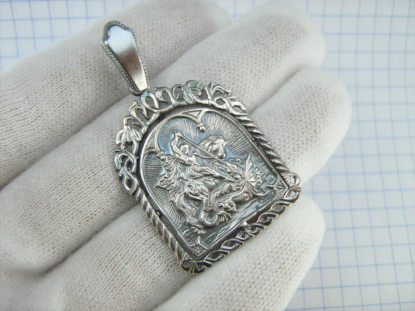 Vintage solid 925 Sterling Silver icon pendant and medal depicting Saint George’s battle with Dragon. Item number MD001671B. Picture 2