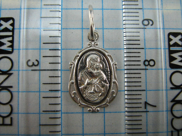 New solid 925 Sterling Silver detailed and oxidized pendant and medal in filigree frame depicting the icon of Mother Mary Tenderness, also called Eleousa, and Jesus Christ. Item number MD000712. Picture 6