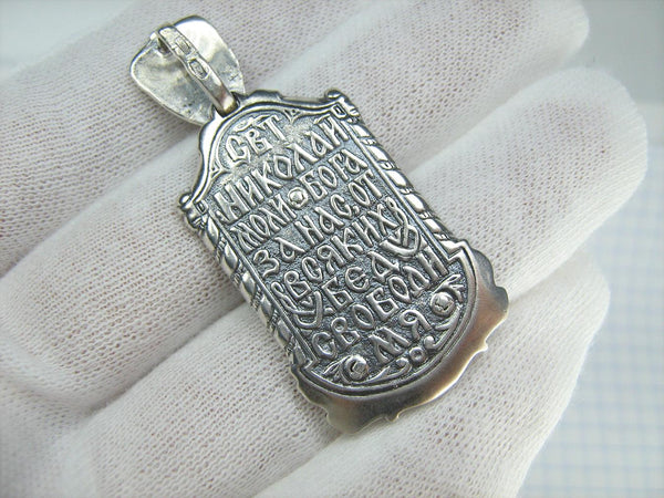 Solid 925 Sterling Silver icon pendant and medal depicting Saint Nicholas the Wonderworker with prayer scripture. Item number MD001878. Picture 3