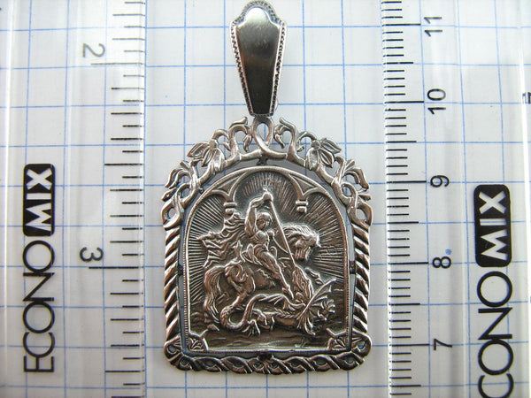 Vintage solid 925 Sterling Silver icon pendant and medal depicting Saint George’s battle with Dragon. Item number MD001671B. Picture 6