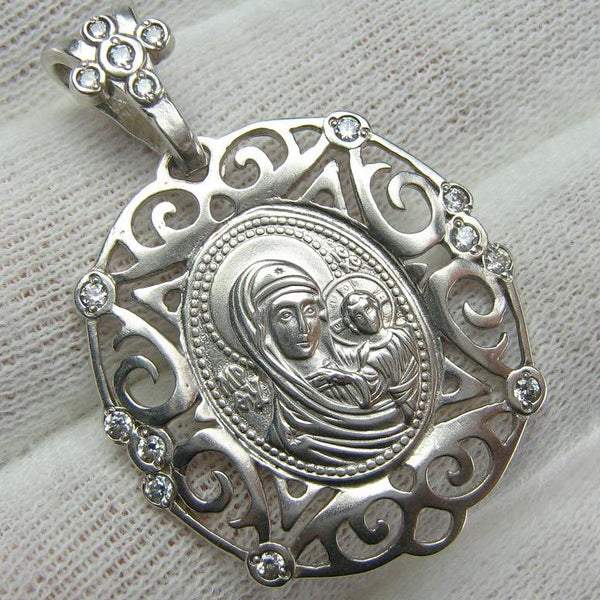 925 Sterling Silver pendant and medal of Kazan icon of Mother of God and Jesus Christ in the openwork frame decorated with stones. Item code MD001527. Picture 1