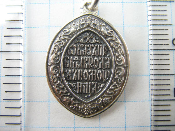 925 Sterling Silver Christian pendant depicting Mother of God Helper at Childbirth. Item number MD001517. Picture 11