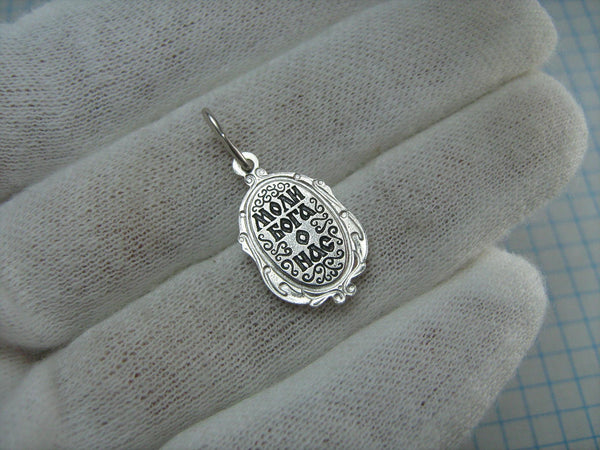 New and never worn solid 925 Sterling Silver small icon pendant and medal with Christian prayer inscription to Saint Martyr Julia holding old believers cross and decorated with filigree frame. Item number MD000730. Picture 3