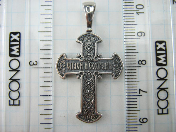 925 Sterling Silver Christian cross pendant and crucifix with prayer inscription decorated with filigree and on the oxidized background. Item number CR000648. Picture 7