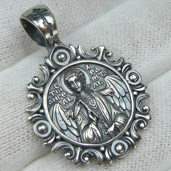 925 Sterling Silver icon pendant and medal depicting Saint Angel with cross and wings. Item number MD001904. Picture 1