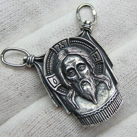 925 Sterling Silver icon pendant shaped relic cloth depicting the face of Savior not made by human hands, also called Vernicle Image of Edessa. Item number MD001401. Picture 1