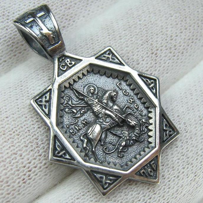 Solid 925 Sterling Silver oxidized icon pendant and medal with prayer scripture to Saint George Victorious depicting the battle with Dragon. Item number MD001906. Picture 1