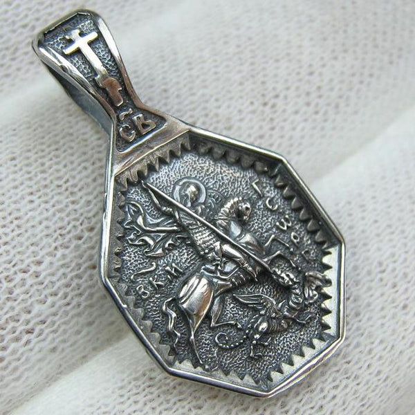 Solid 925 Sterling Silver oxidized icon pendant and medal with prayer scripture to Saint George Victorious depicting the battle with Dragon. Item number MD001907. Picture 1