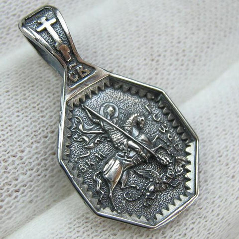 Solid 925 Sterling Silver oxidized icon pendant and medal with prayer scripture to Saint George Victorious depicting the battle with Dragon. Item number MD001907. Picture 1