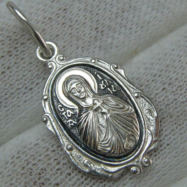 New and never worn solid 925 Sterling Silver small icon pendant and medal with Christian prayer inscription to Saint Martyr Julia holding old believers cross and decorated with filigree frame. Item number MD000730. Picture 1