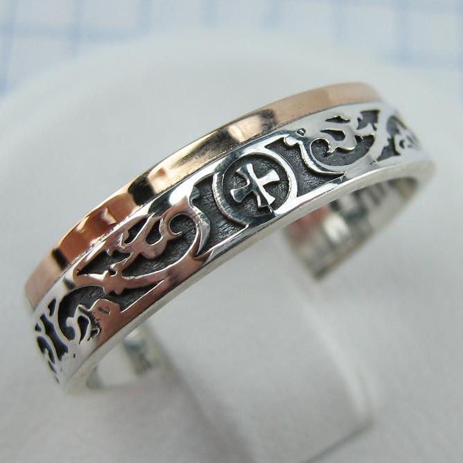 925 Sterling Silver and 375 gold band with prayer text inside the ring, decorated with Maltese cross and oxidized pattern. Item code RI001940. Picture 1