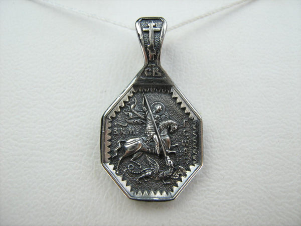 Solid 925 Sterling Silver oxidized icon pendant and medal with prayer scripture to Saint George Victorious depicting the battle with Dragon. Item number MD001907. Picture 4