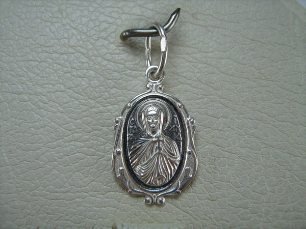 New and never worn solid 925 Sterling Silver small icon pendant and medal with Christian prayer inscription to Saint Martyr Julia holding old believers cross and decorated with filigree frame. Item number MD000730. Picture 4
