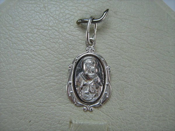 New solid 925 Sterling Silver detailed and oxidized pendant and medal in filigree frame depicting the icon of Mother Mary Tenderness, also called Eleousa, and Jesus Christ. Item number MD000712. Picture 4