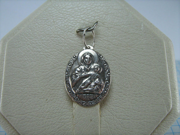 Vintage solid 925 Sterling Silver pendant and medal in filigree frame depicting Kozelshchanskaya icon of Mother of God and Jesus Christ holding cross