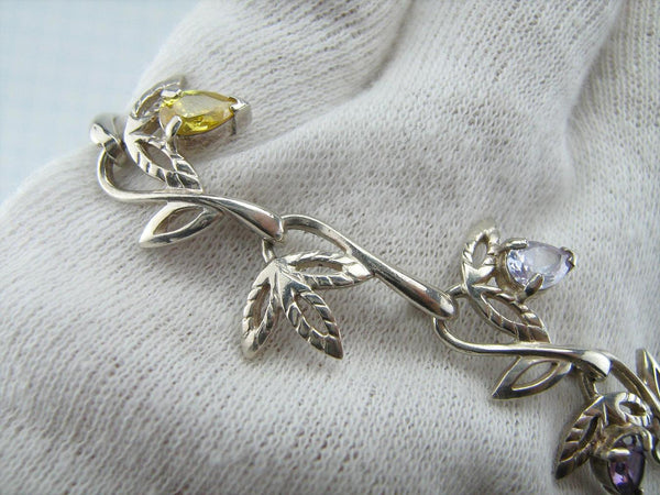 925 solid Sterling Silver bracelet with leaf pattern decorated with manual work and multicolor Cubic Zirconia stones.