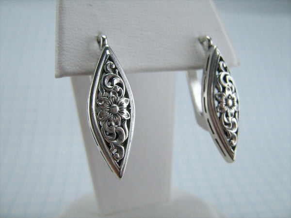 925 solid Sterling Silver marquise shaped earrings with latch back snap closure decorated with openwork filigree pattern, suitable for everyday and casual wearing.