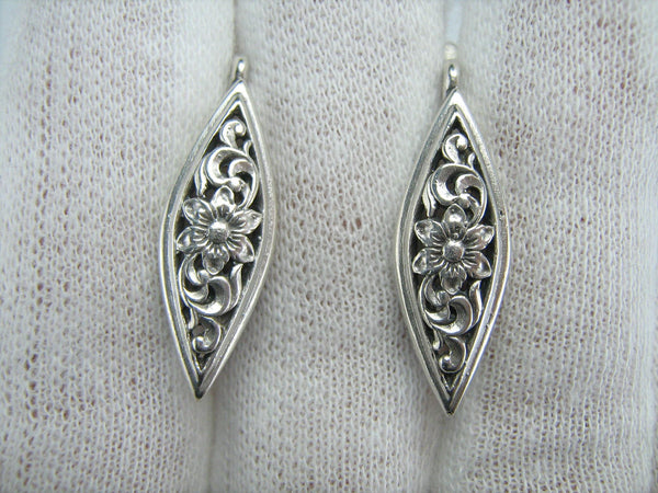 925 solid Sterling Silver marquise shaped earrings with latch back snap closure decorated with openwork filigree pattern, suitable for everyday and casual wearing.