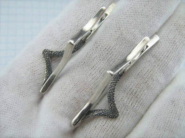 925 solid Sterling Silver long earrings of a rare design with latch back snap closure and oxidized pattern.