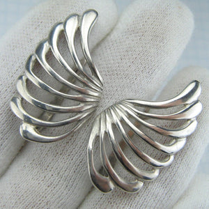 925 Sterling Silver earrings latch back snap closure shaped wings with openwork design.