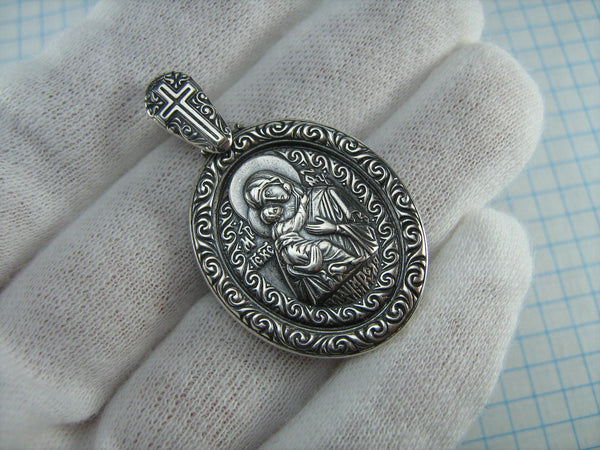 Vintage solid 925 Sterling Silver detailed pendant and medal in filigree frame with Christian cross depicting the icon of Mother Mary of Vladimir and Jesus Christ