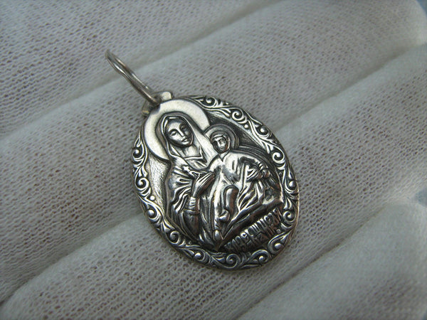 Vintage solid 925 Sterling Silver pendant and medal in filigree frame depicting Kozelshchanskaya icon of Mother of God and Jesus Christ holding cross