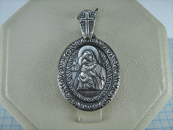 Vintage solid 925 Sterling Silver detailed pendant and medal in filigree frame with Christian cross depicting the icon of Mother Mary of Vladimir and Jesus Christ