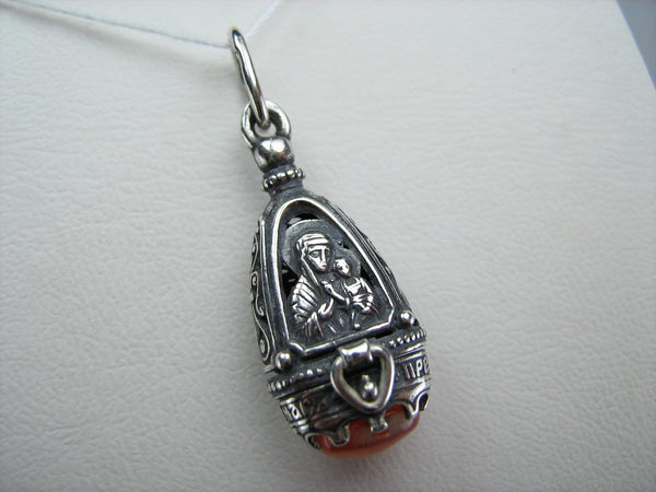 New solid 925 Sterling Silver oxidized icon pendant and locket depicting Mother of God Mary, Jesus Christ and the prayer inscription, decorated with orange-red oval cabochon of cat’s eye stone.