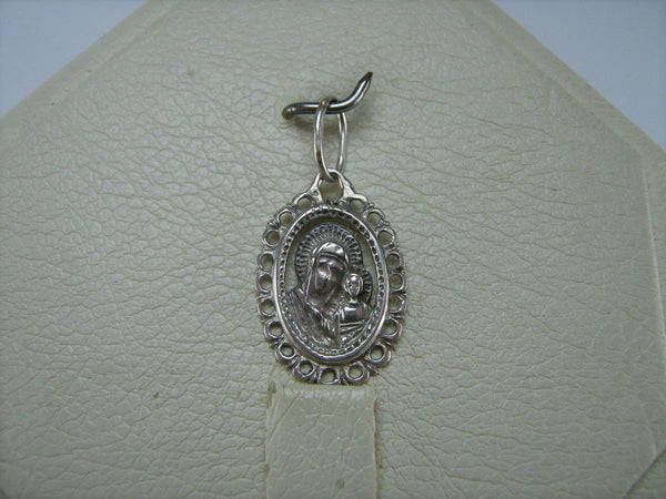 Real pure solid 925 Sterling Silver vintage oval icon pendant and medal in frame showing Mother of God Blessed Virgin Mary with Jesus Christ child decorated with openwork finish