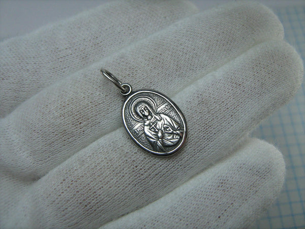 Vintage solid 925 Sterling Silver small oval oxidized icon pendant and medal with Christian prayer inscription to Saint Martyr Natalia decorated with old believers’ cross.