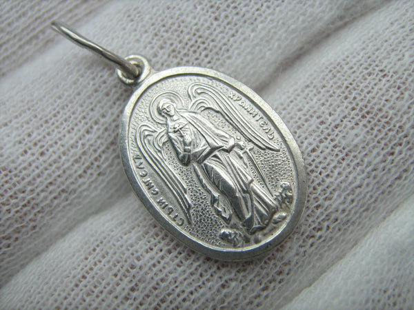 Solid 925 Sterling Silver small necklace that shows Saint Angel Michael with wings, sword, old believers cross and Christian prayer inscription.