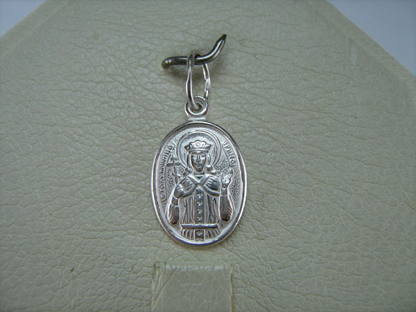 New and never worn solid 925 Sterling Silver small oval icon pendant and medal with Christian prayer text to Saint Martyr Irina, also called Irene, holding old believers cross