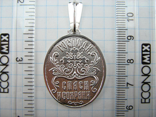 Vintage solid 925 Sterling Silver large icon pendant and medal depicting Saint Nicholas the Wonderworker decorated with images of cherubim, grapevine cross, fleur-de-lis, Celtic knot and prayer text.