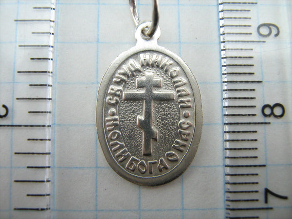 925 Sterling Silver small icon pendant and medal depicting Saint Nicholas the Wonderworker and old believers cross with prayer text.