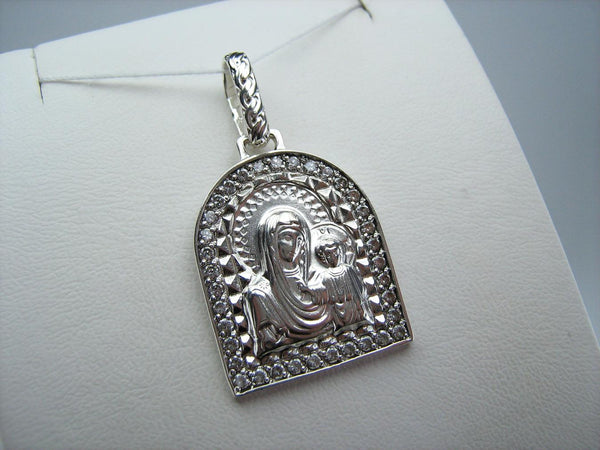 925 Sterling Silver pendant and medal of Kazan icon of Mother of God and Jesus Christ in the geometrical frame decorated with CZ stones.