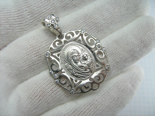 925 Sterling Silver pendant and medal of Kazan icon of Mother of God and Jesus Christ in the openwork frame decorated with stones.