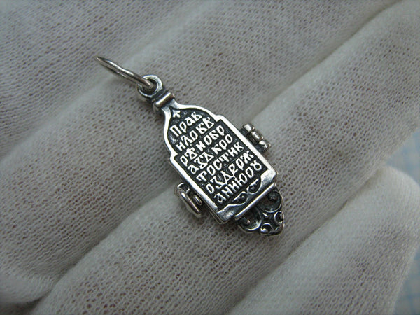 New and never worn solid 925 Sterling Silver oxidized openwork icon pendant in filigree frame and locket openable medallion with Christian prayer inscription to Saint Nicholas the Wonderworker depicting the crucifixion