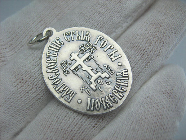 925 Sterling Silver detailed pendant and oxidized medal in filigree oval frame depicting the icon of Mother Mary Pochayivskaya.