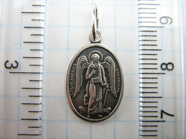 Solid 925 Sterling Silver small medal depicting Saint Angel the Guardian with Christian prayer inscription.