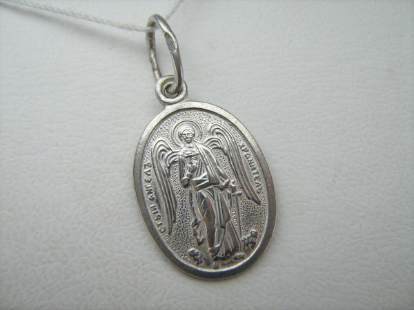 Solid 925 Sterling Silver small necklace that shows Saint Angel Michael with wings, sword, old believers cross and Christian prayer inscription.
