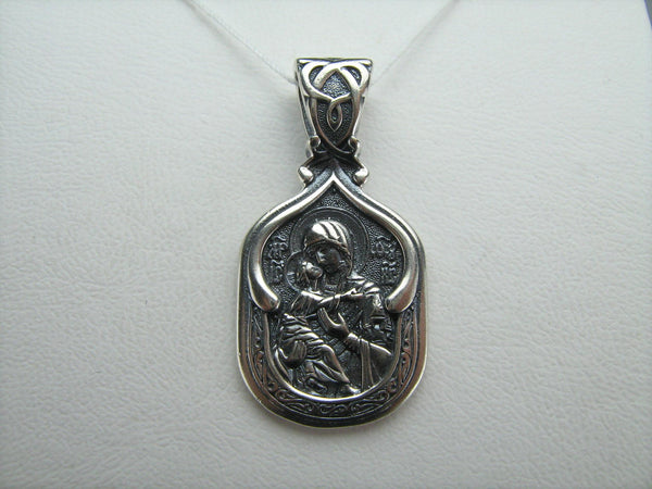 925 Sterling Silver detailed pendant and medal depicting the icon of Mother Mary of Vladimir and Jesus Christ.
