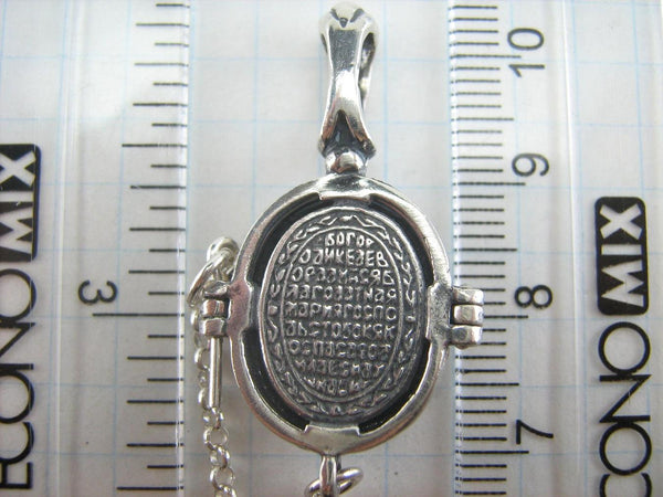 Solid 925 Sterling Silver small oval oxidized icon pendant and medal with prayer inscription to Saint Martyr Nika holding a Christian cross and decorated with oval frame and oxidized finish.