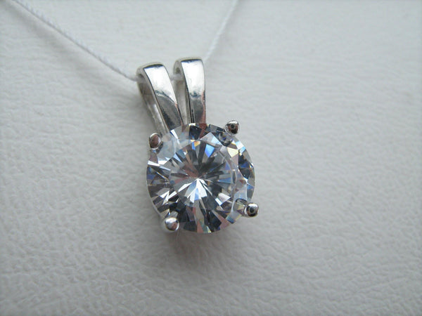 925 Sterling Silver small pendant with white Cubic Zirconia stone with classic design.