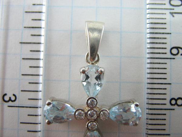 New solid 925 Sterling Silver cross pendant decorated with sky blue topaz gemstones.